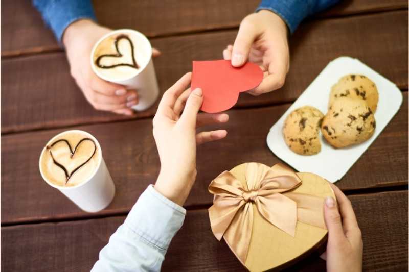 People Swapping Gifts For A Cookie Swap