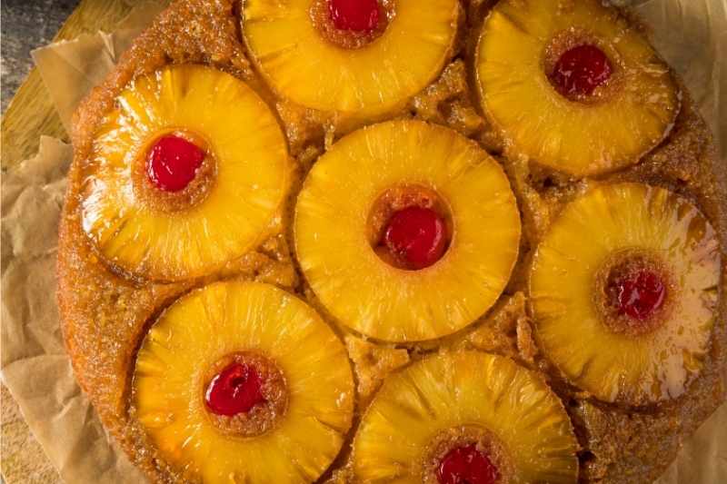 Pineapple Upside-Down Cake with Pineapples and cherries