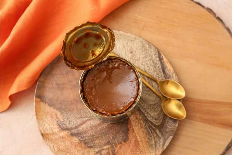 Condensed milk caramelizes into brown when boiled