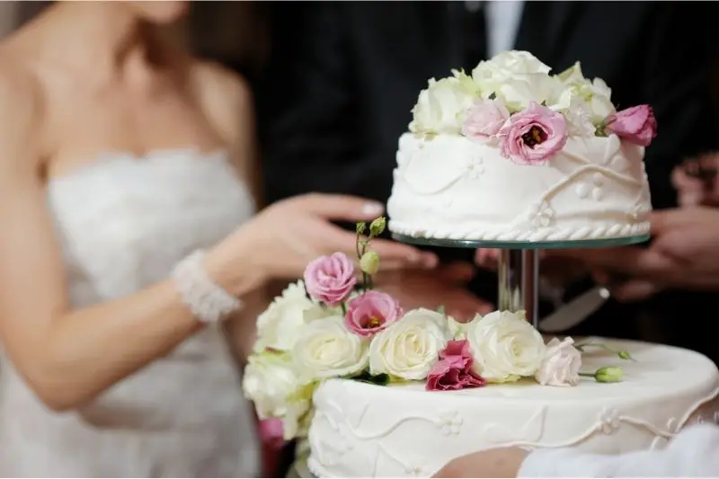 Bride and Groom Cutting a Wedding Cake